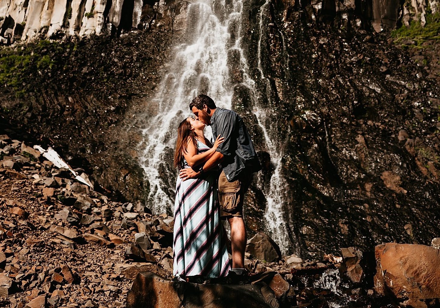 adventure engagement session with waterfall
